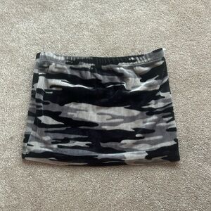 A black, gray, and white tube top.